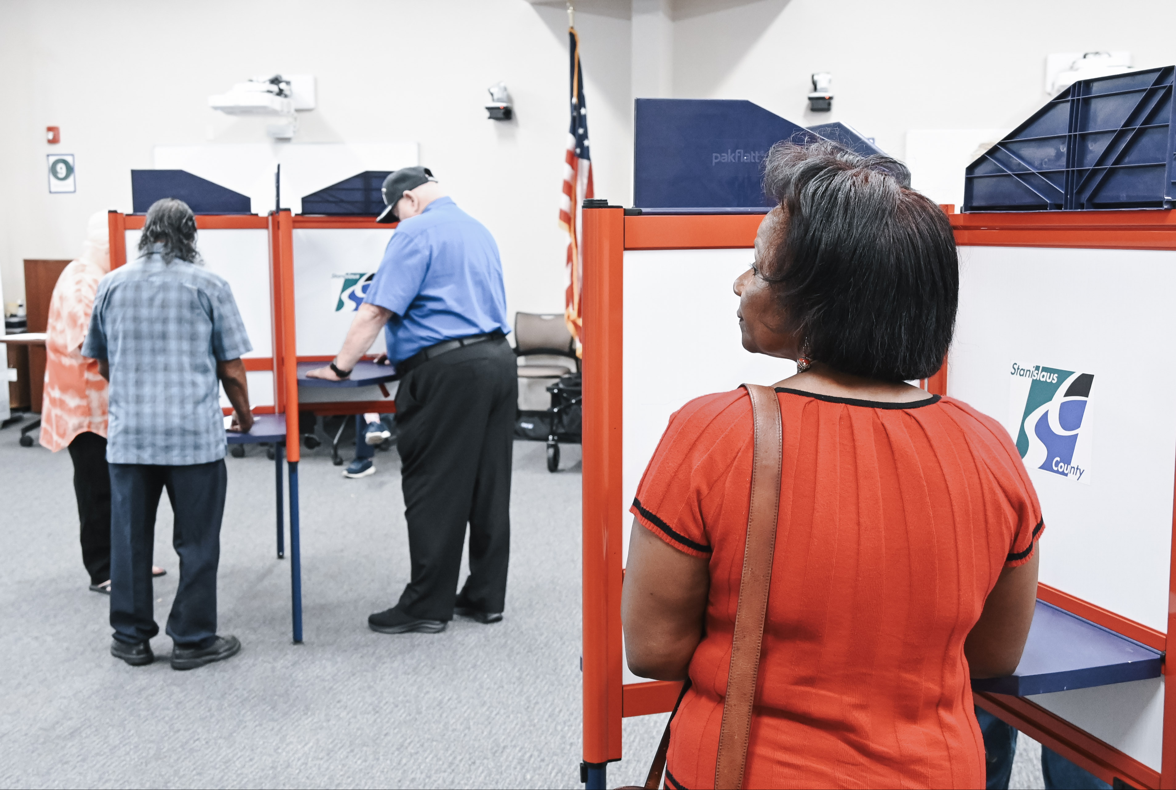 Voters using voting booths inside a vote center
